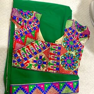 Green border saree with stitched blouse. Ready to wear.